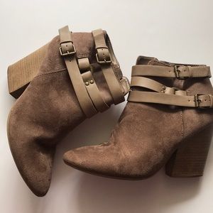 Tan boots with buckets. Zip sides. Size 8.5